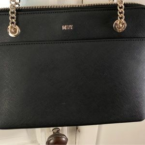 Brand new black with gold metal chain strap purse. DKNY.